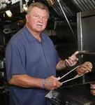 Photo of Coach Ditka grilling the best Steak he ever had