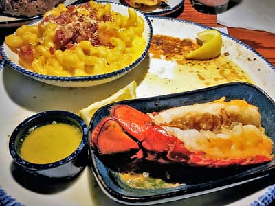 butter lobster tails served with mac and cheese